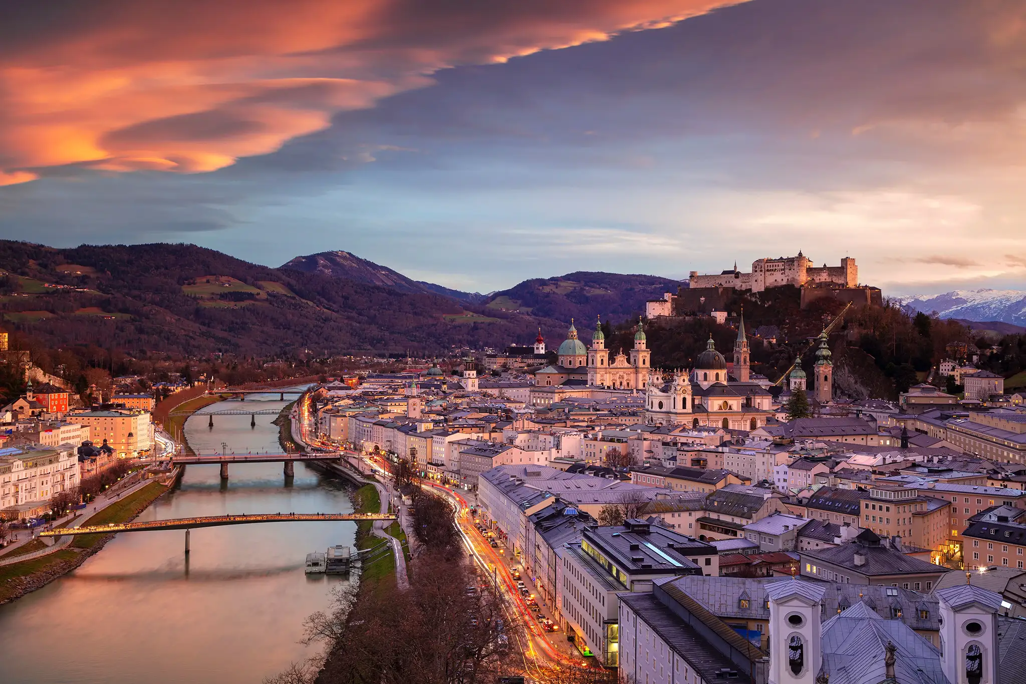 Image of Salzburg, Austria with Salzburg Cathedral during beautiful winter sunset.