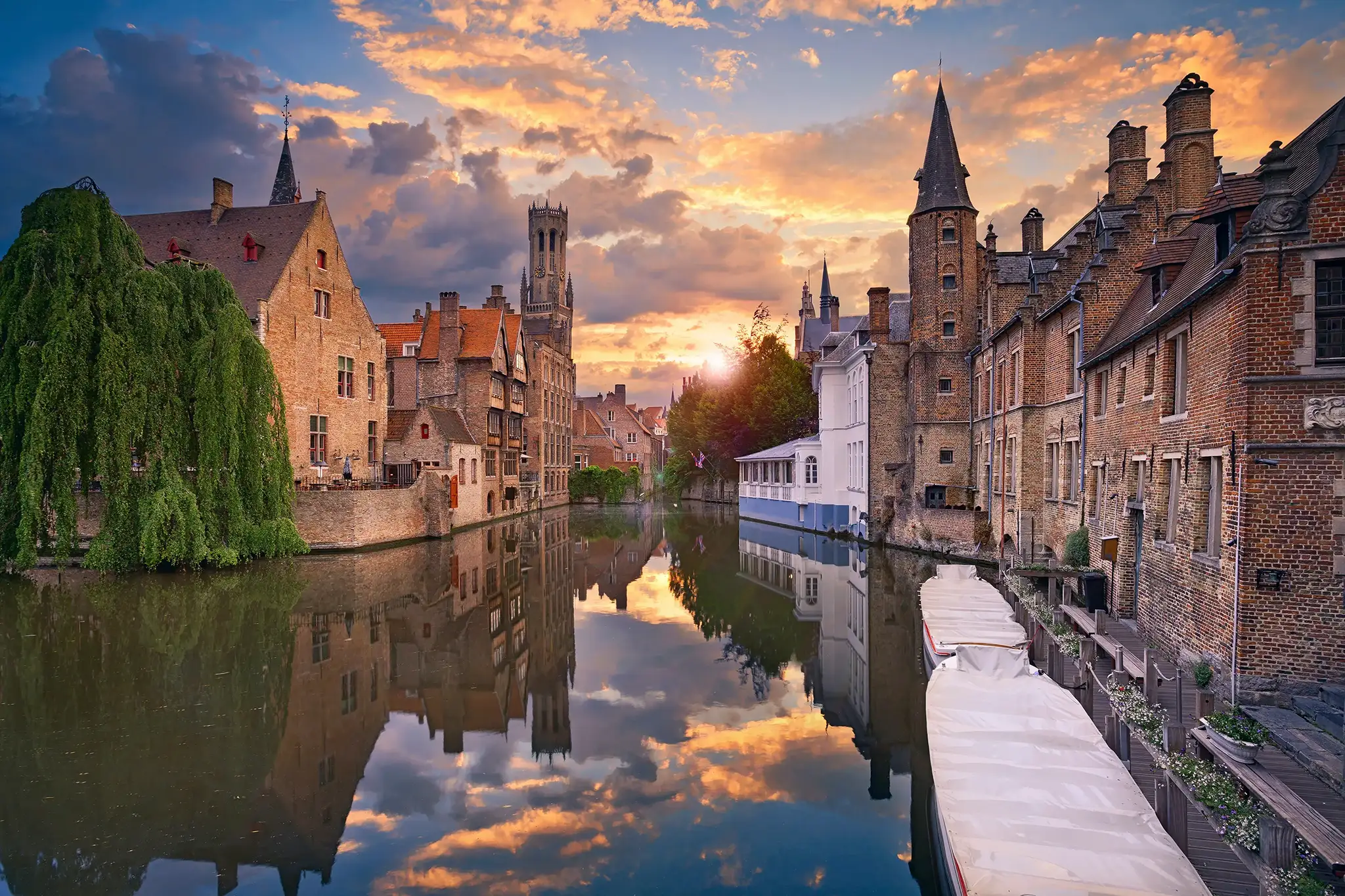 Image of Bruges, Belgium during dramatic sunset.