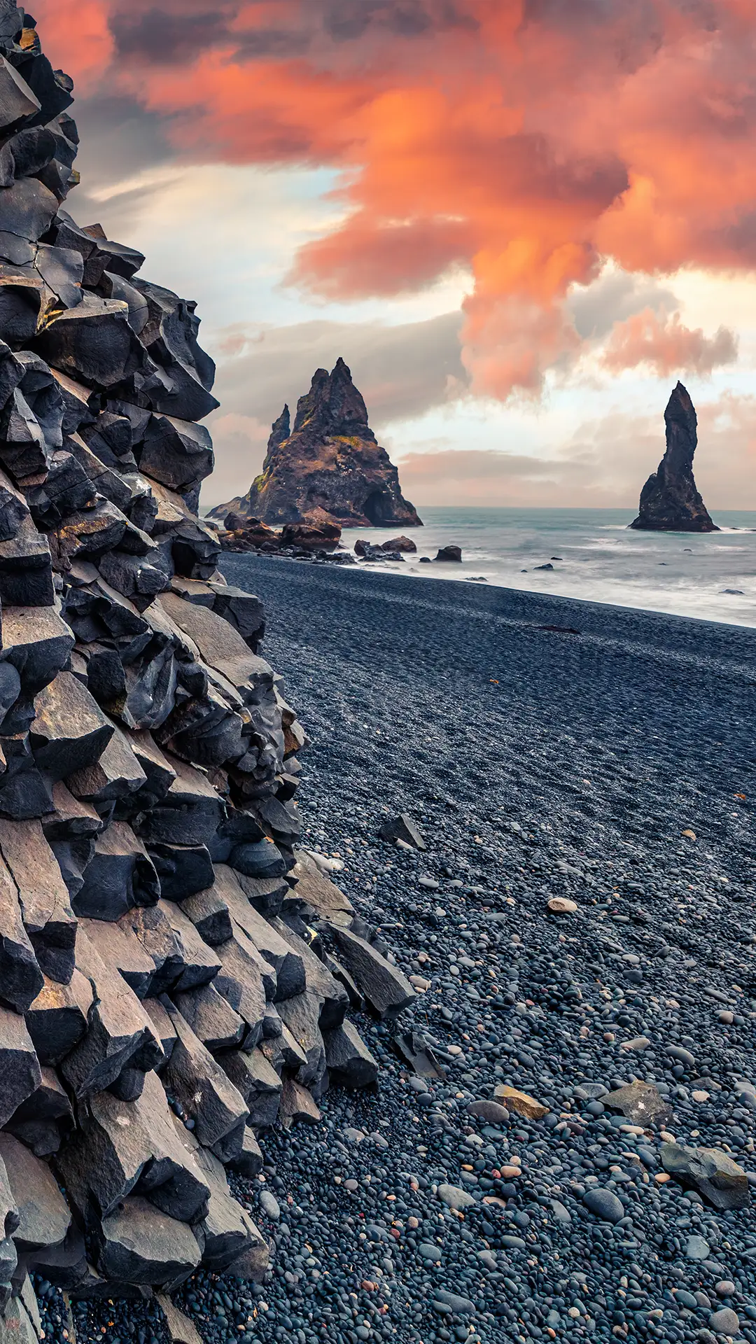 Sunset on Reynisdrangar cliffs in Iceland.