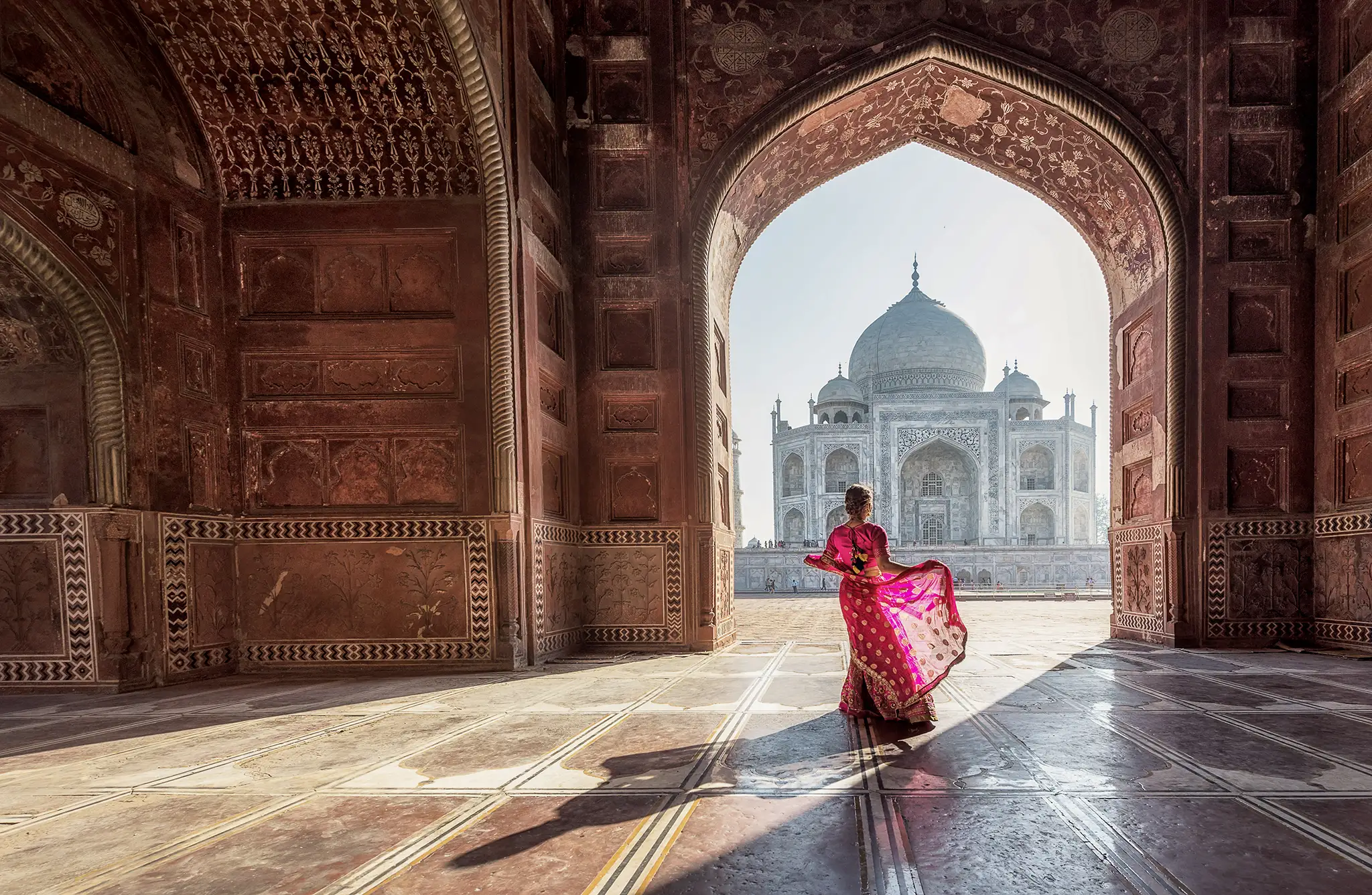 Woman in sari at Taj Mahal.