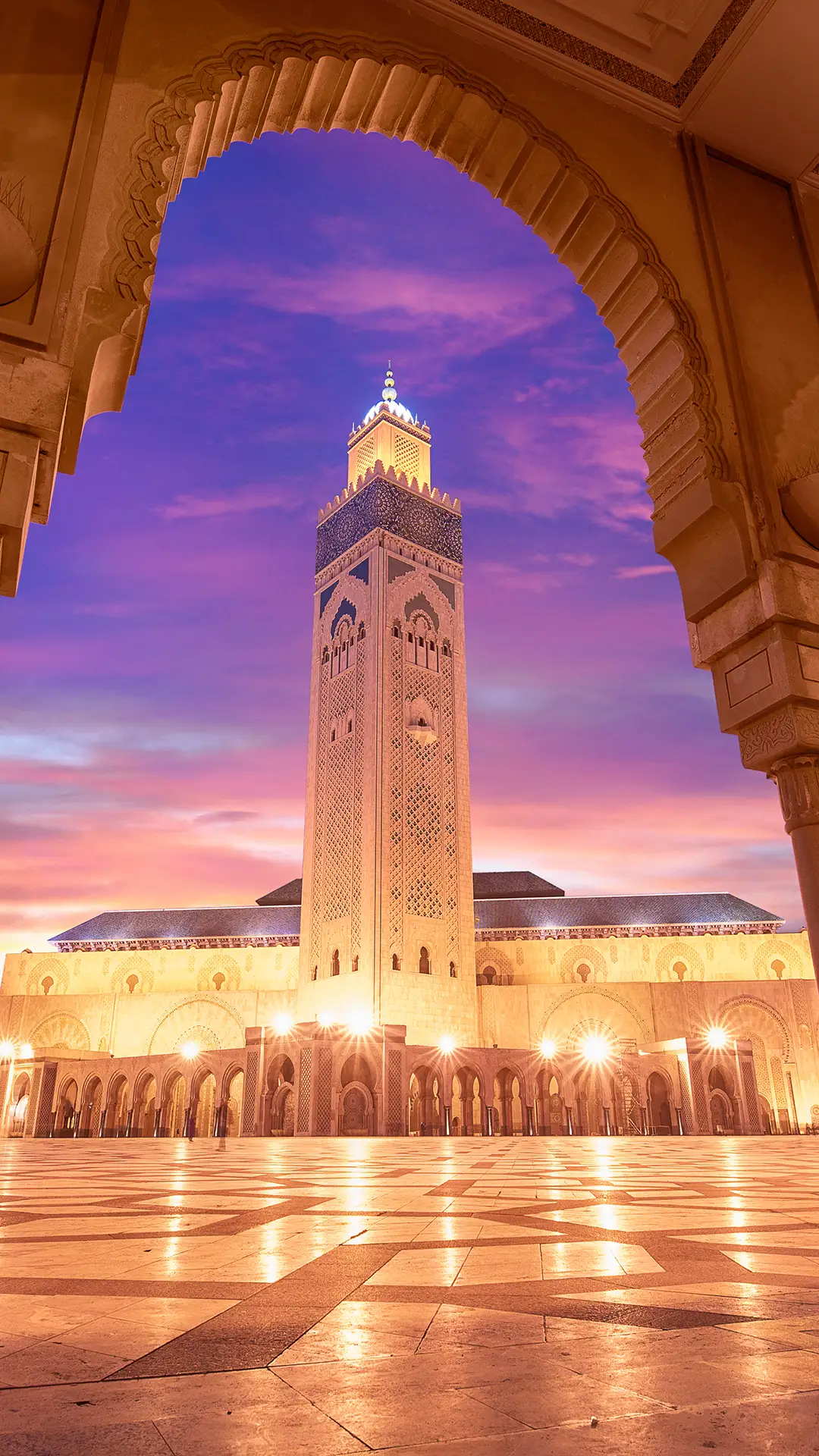 The Hassan II Mosque at sunset in Casablanca, Morocco.