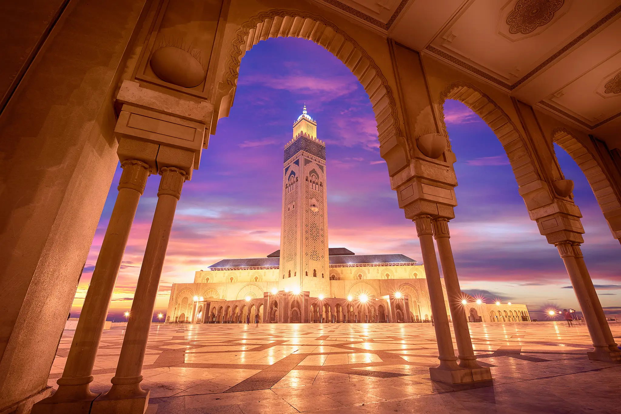The Hassan II Mosque at sunset in Casablanca, Morocco.