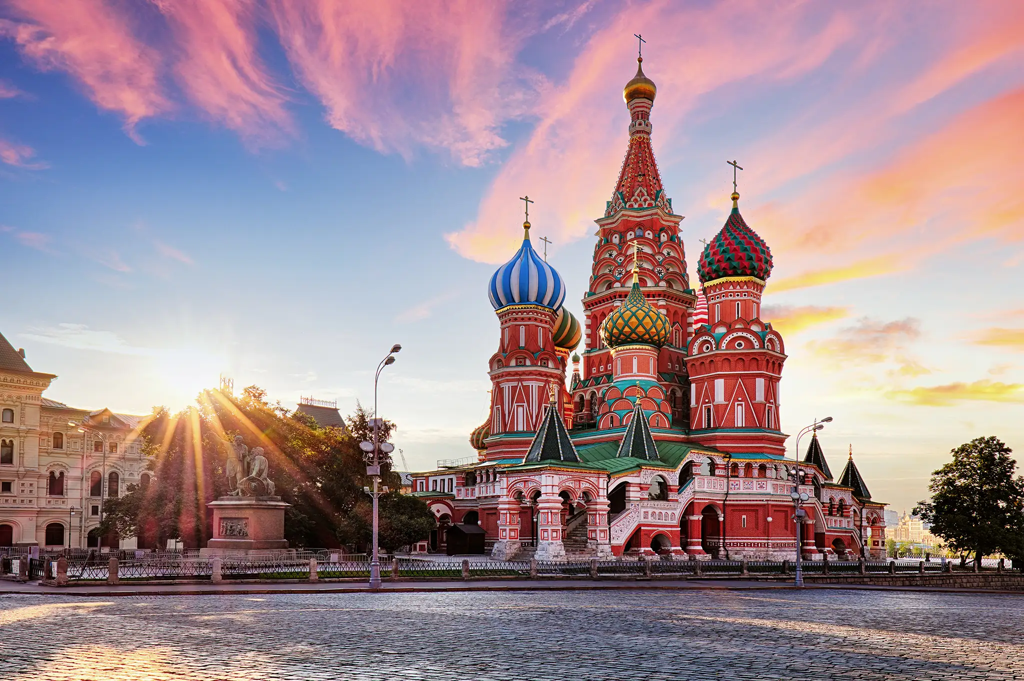 Red square view of St. Basil's Cathedral at sunrise.