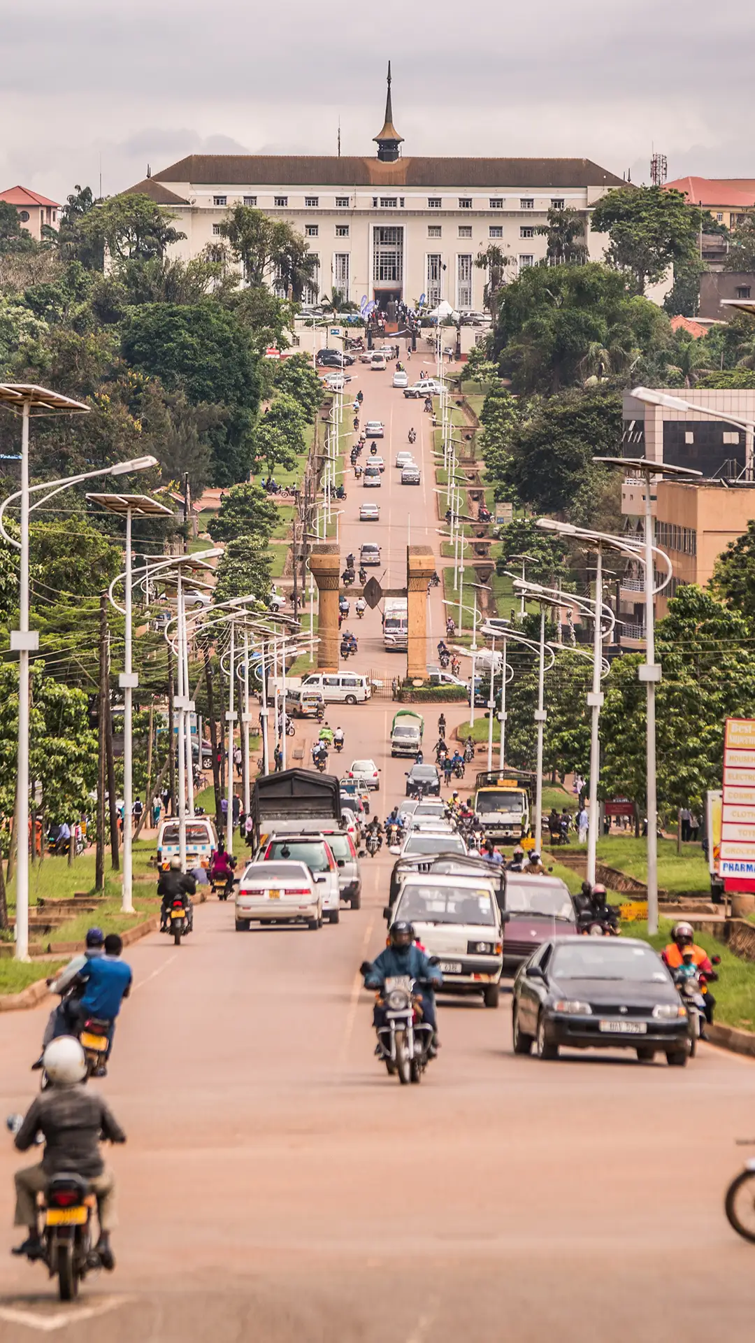 Long straight road to Parliament House in Kampala, Uganda.