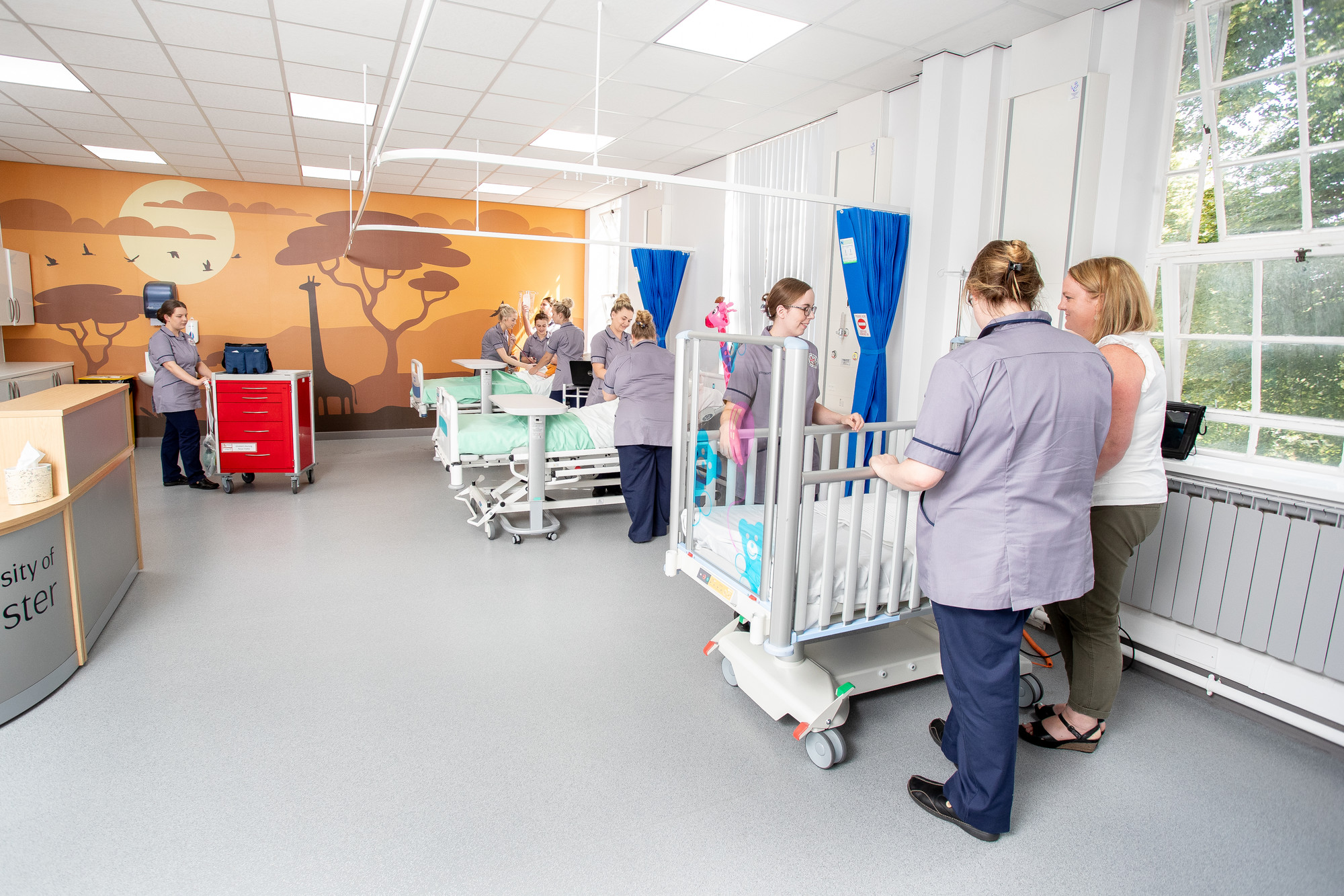 Student midwives in a simulation room