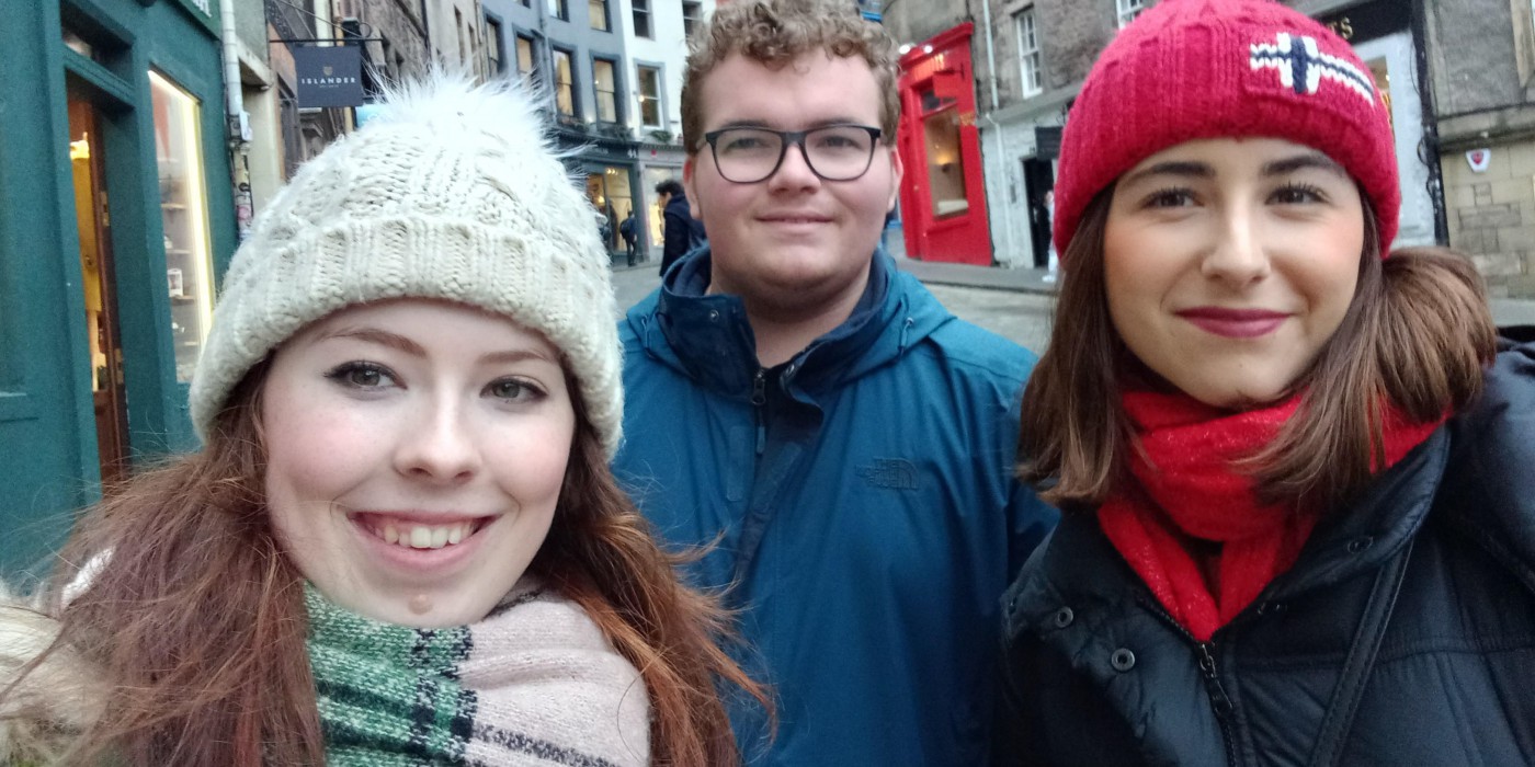Three students in the centre of Edinburgh