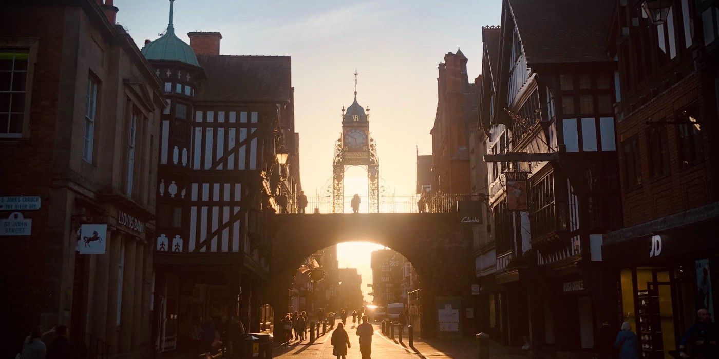 The famous Chester clock and city walls at sunset