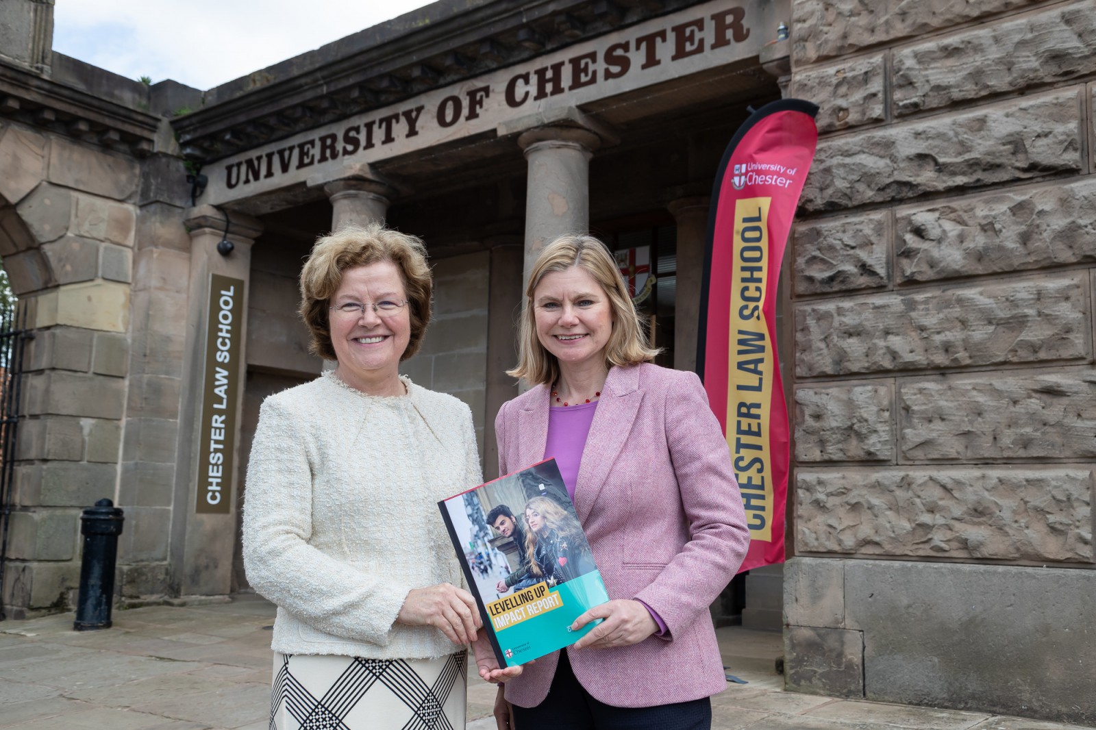 University of Chester VC and Justine Levelling hold the Levelling Up Impact Report