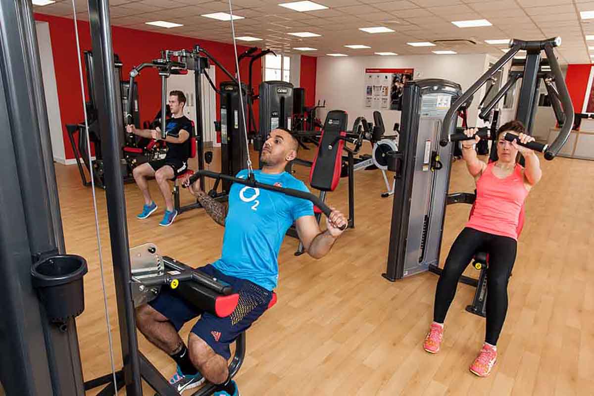 Group of people in the fitness suite exercising